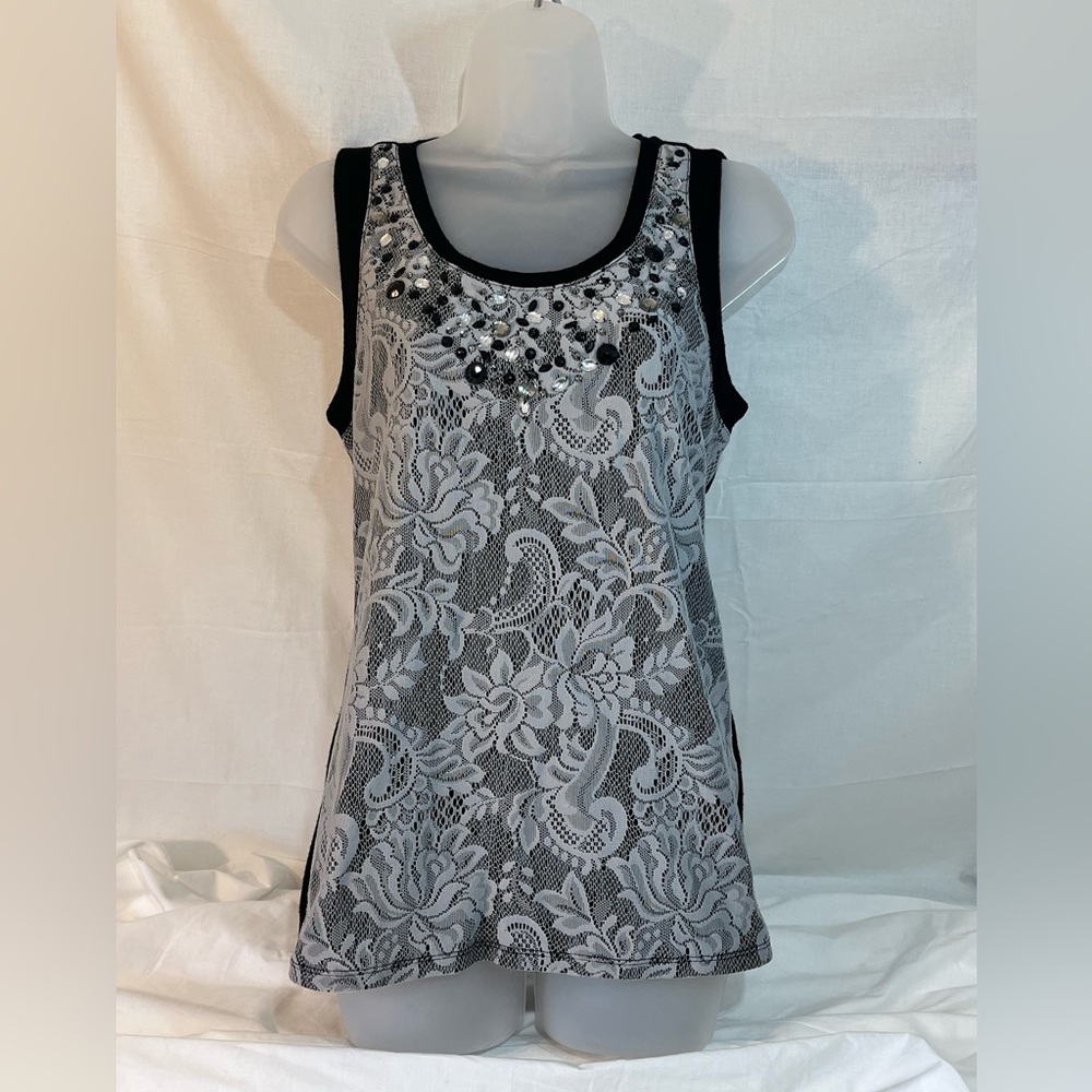 White lace tank with front sequined edging. Black background/and back. Medium.